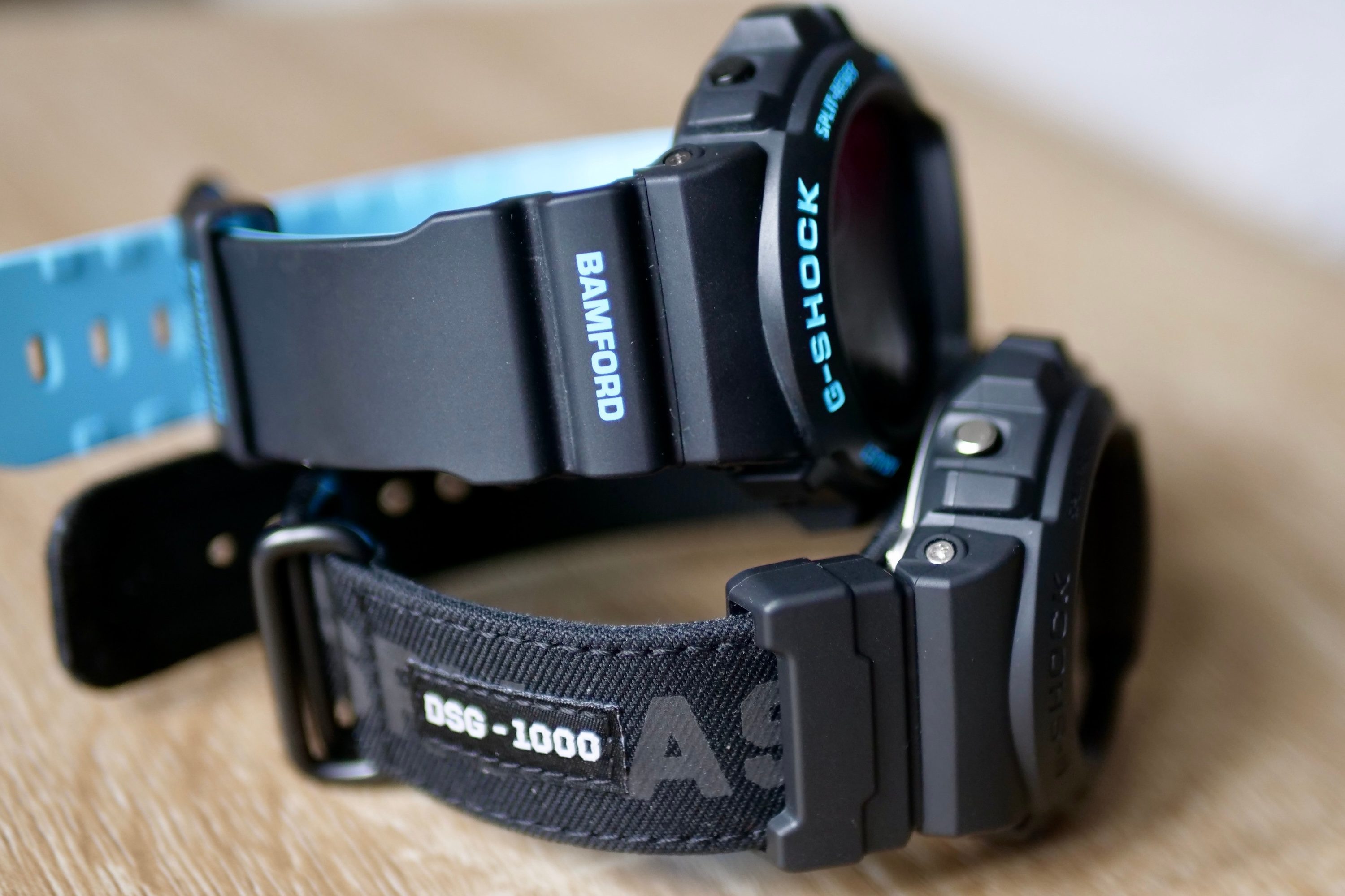 The G-Shock x ASRV DW-6900 with the G-Shock x Bamford DW-6900, showing a comparison of lug and band design.