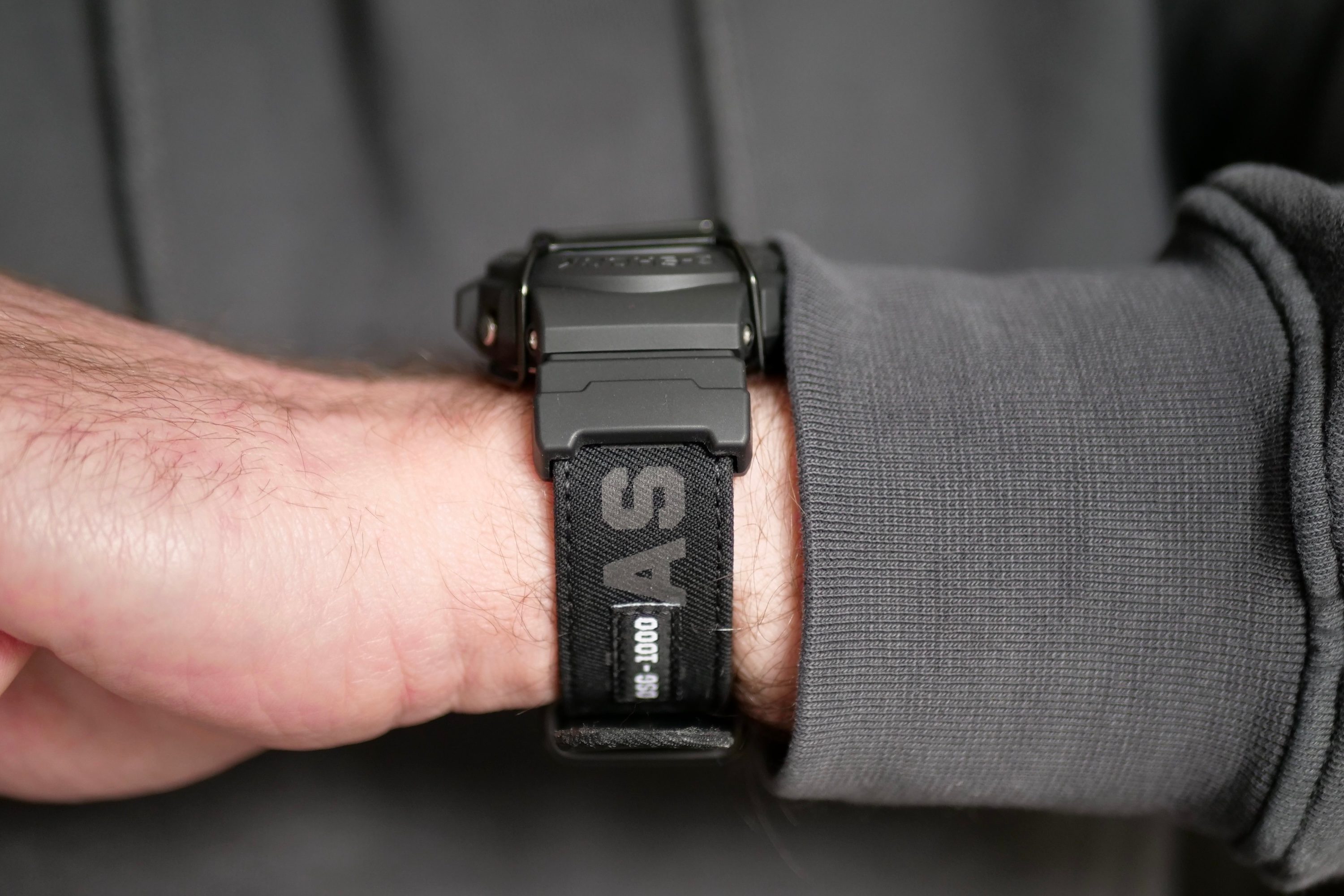 A person wearing the G-Shock x ASRV DW-6900.