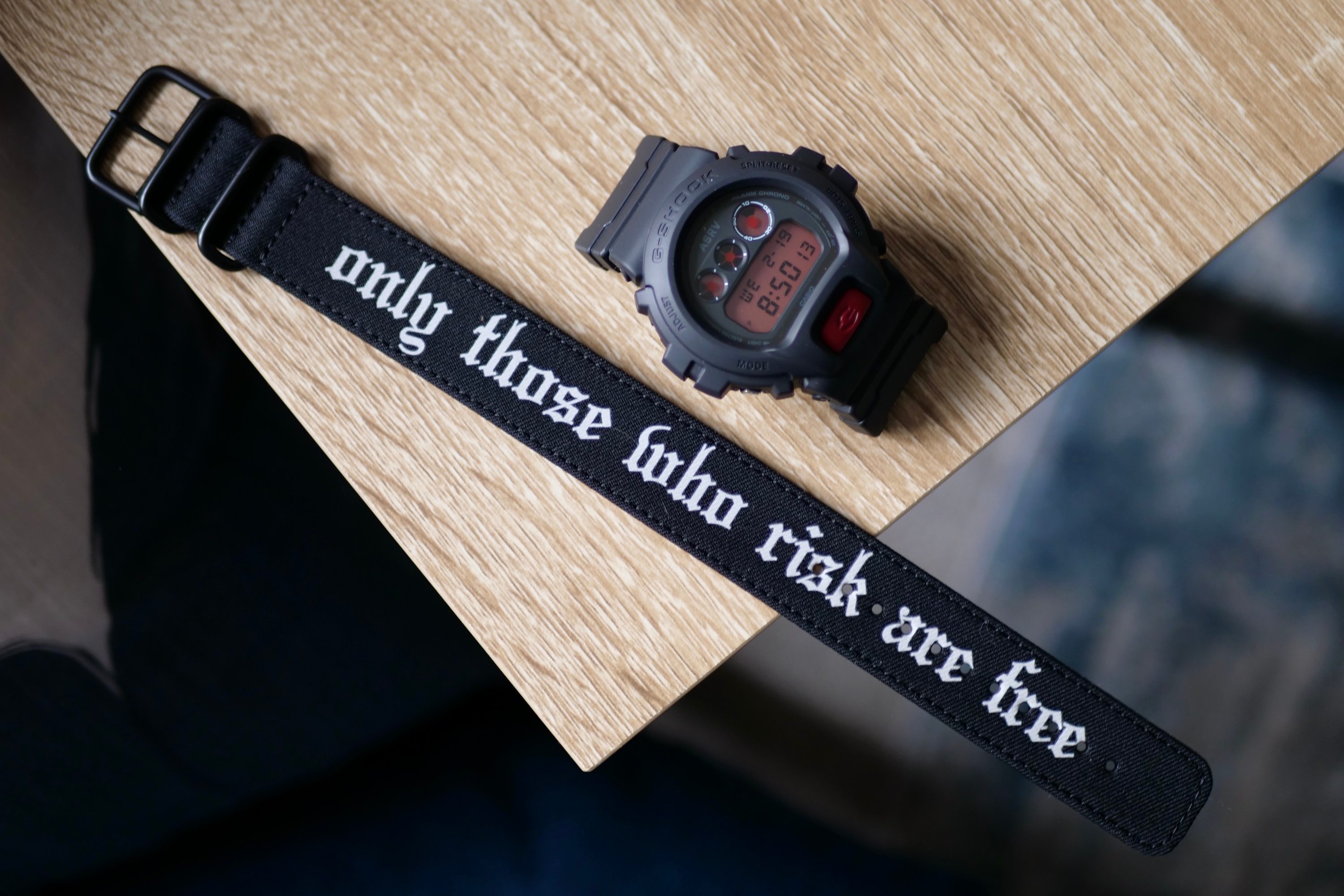 The G-Shock x ASRV DW-6900 with one of its bands.