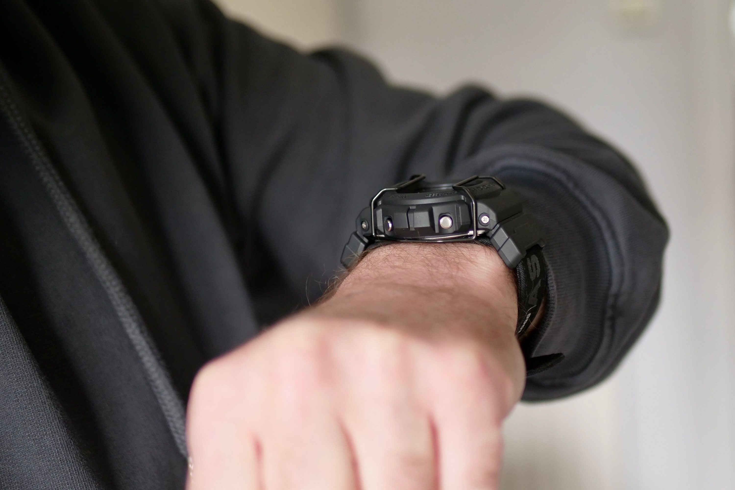 A person wearing the G-Shock x ASRV DW-6900.