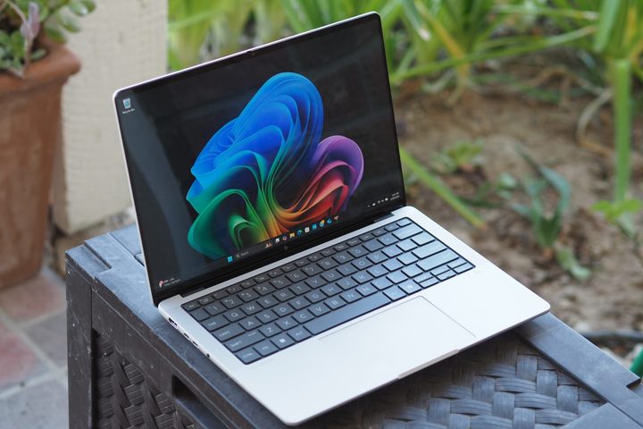 HP EliteBook X G1a front angled view showing display and keyboard.