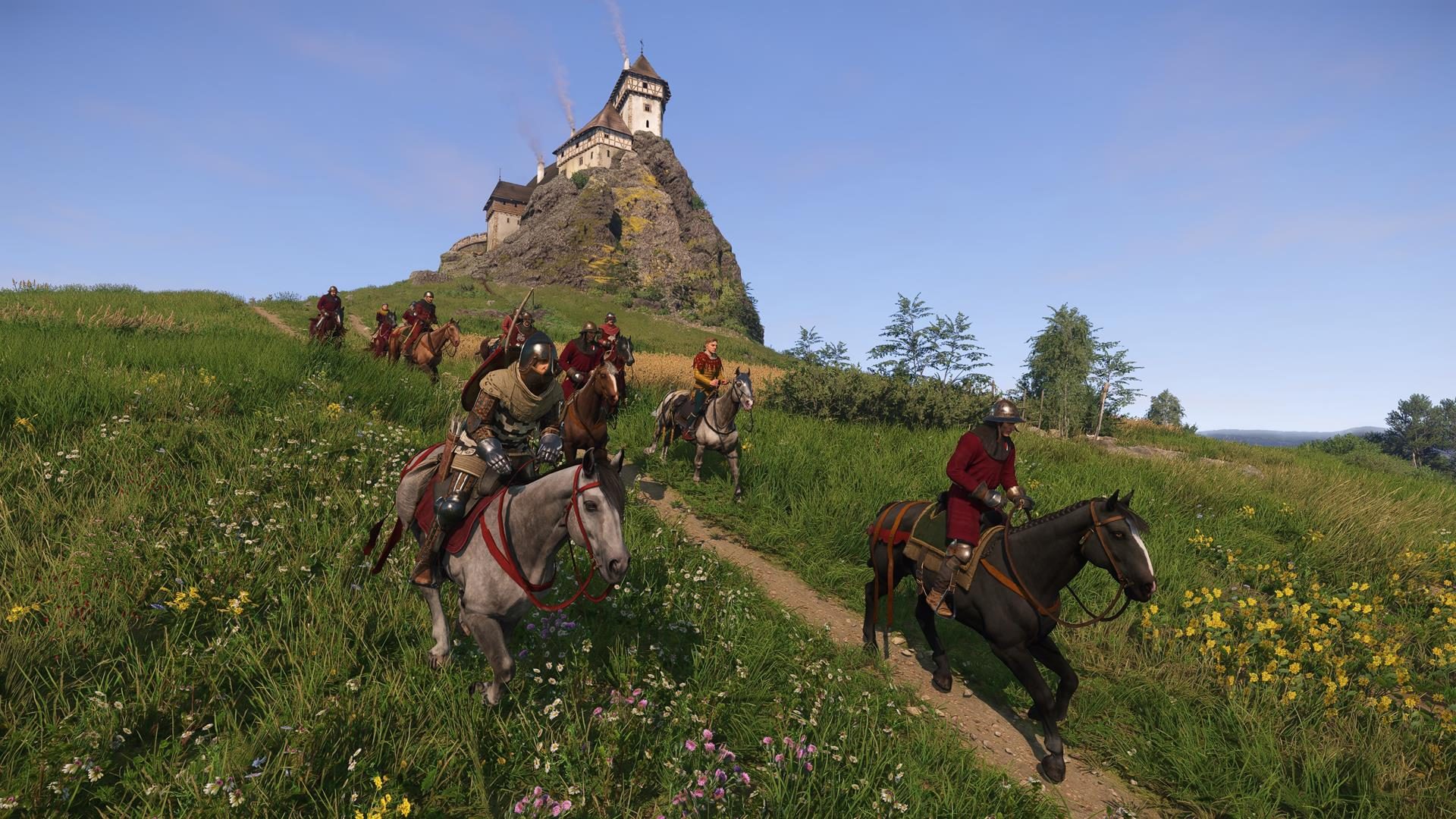 Horsemen ride down a hill in Kingdom Come: Deliverance 2.