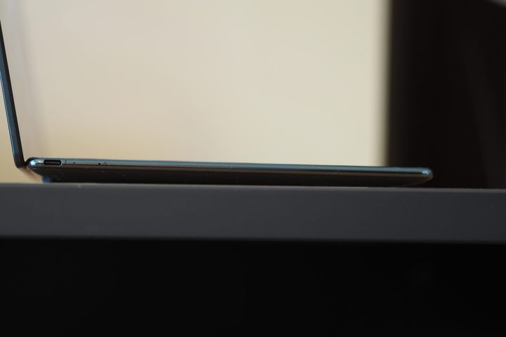 Lenovo Yoga Slim 9i 14 Gen 10 side view showing lid and ports.