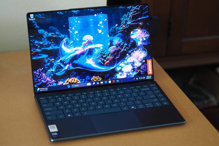 Lenovo Yoga Slim 9i 14 Gen 10 front angled view showing display and keyboard.