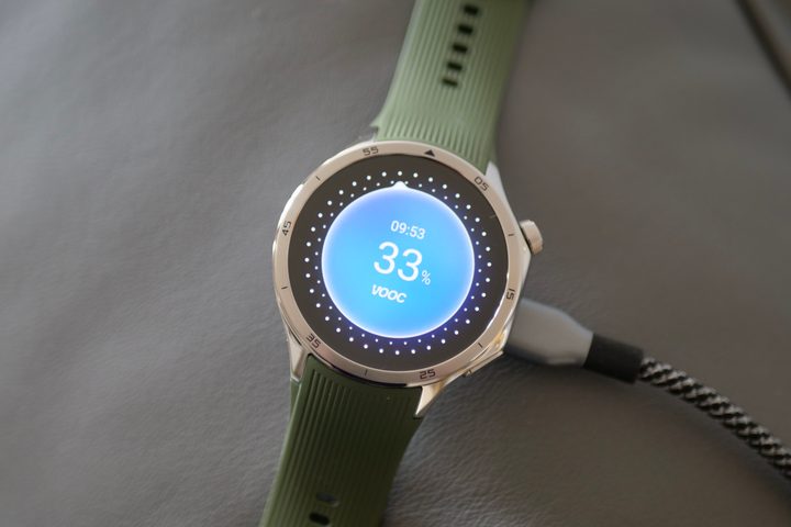 The OnePlus Watch 3 on charge.