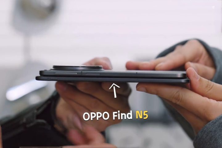 Oppo Find N5 held underneath the Oppo Find N3 foldable phone.