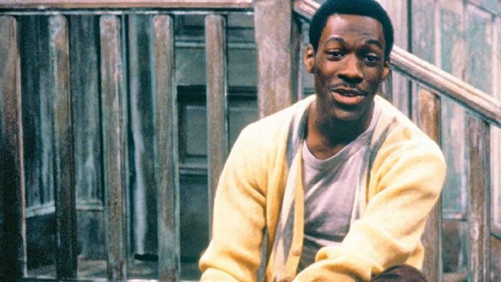Eddie Murphy sitting on the stoop talking as Mr. Robinson on SNL.