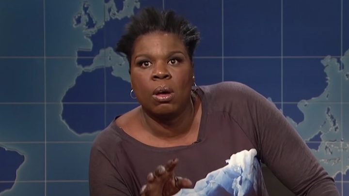 Leslie Jones animatedly talking on Weekend Update on SNL.