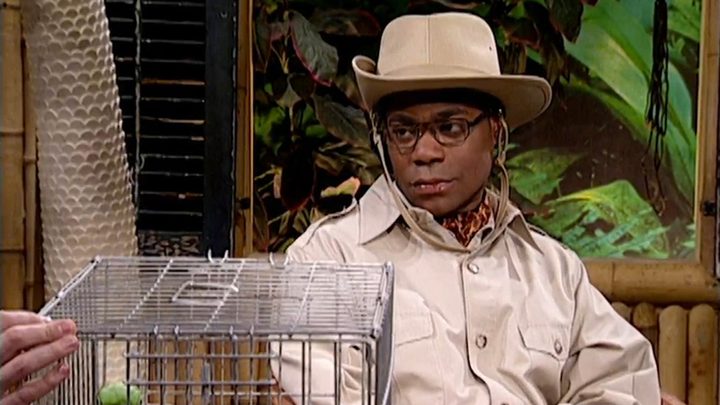 Tracy Morgan as Brian Fellow on SNL in a safari hat looking unimpressed.