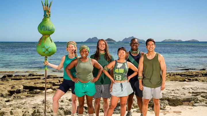 Members of the Vula tribe post on the beach in Survivor 48.