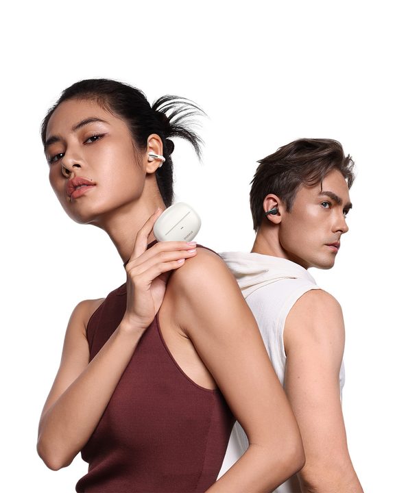 Two people wearing baseus headphones