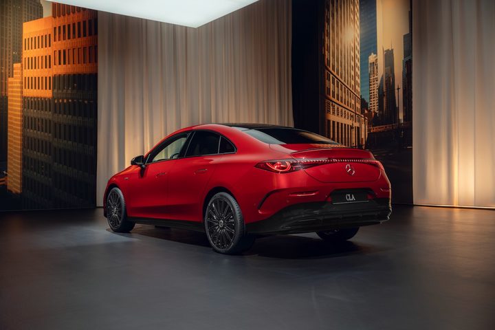 2026 Mercedes-Benz CLA EV rear quarter view.
