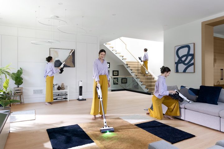 woman cleaning her home performing various tasks