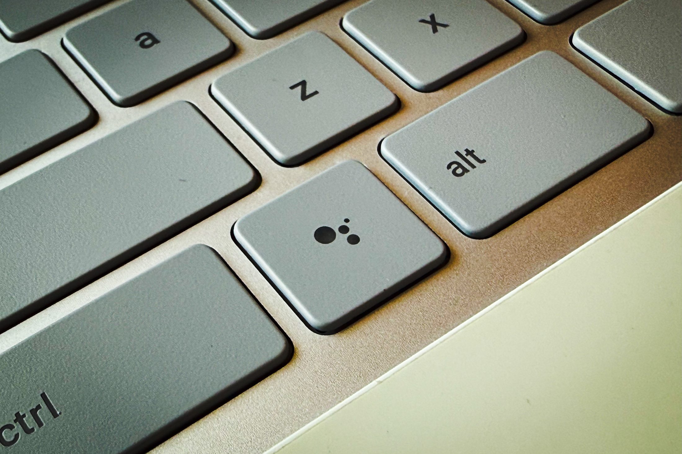Dedicated Google Assistant button on Chromebook.