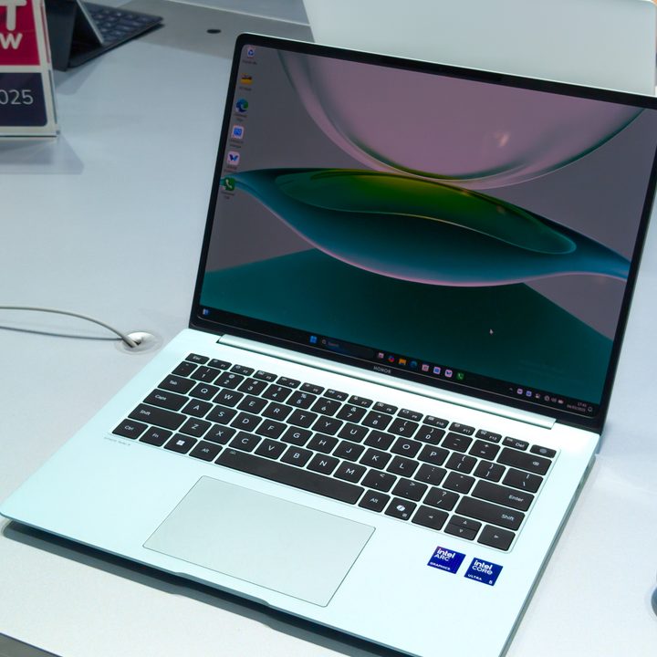 The Honor MagicBook Pro 14 in green and white