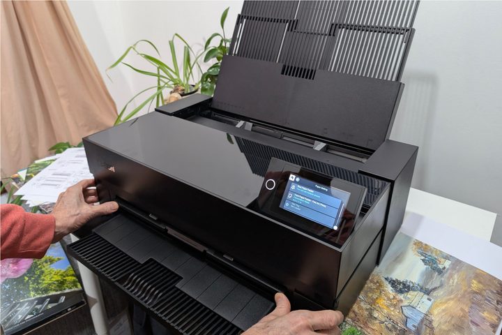 Make sure the SureColor P900's front feeder tray is fully engaged before printing.