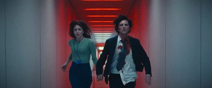 Mark and Helly running down a hallway in Lumon in "Severance" season 2.