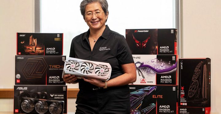 AMD CEO Lisa Su holding an AMD Radeon RX 9070 XT GPU