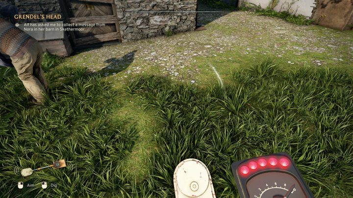 A metal detector lighting up in Atomfall.