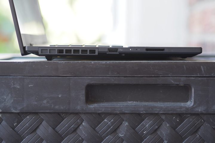 ASUS Vivobook Pro 15 2025 side view showing ports, vents, and lid.