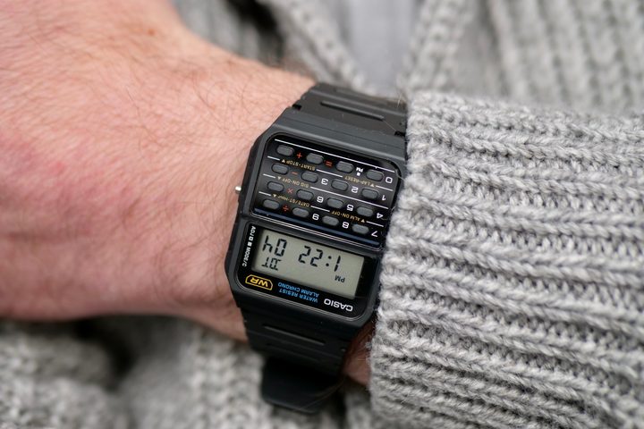 A person wearing the Casio Data Bank watch.