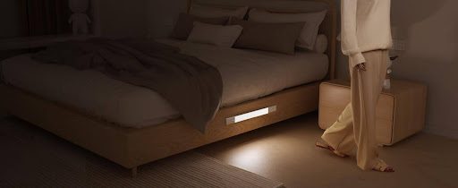 Bedroom with bedside lighting