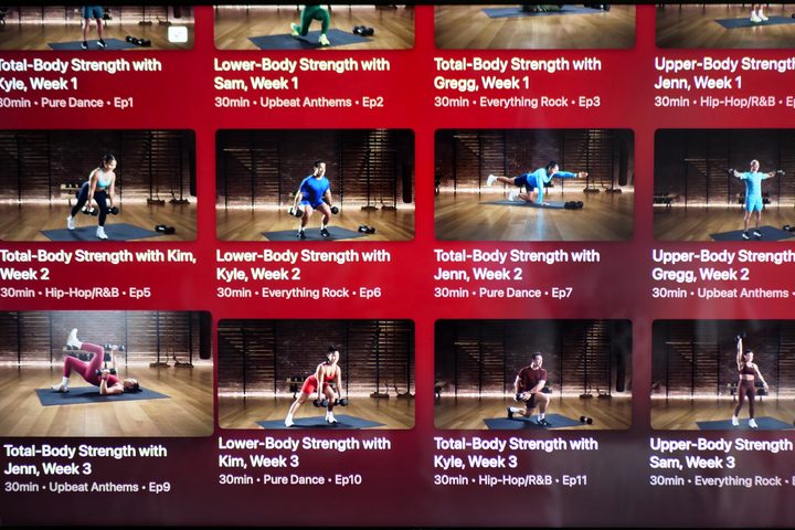 An Apple Fitness+ workout screen on a TV.