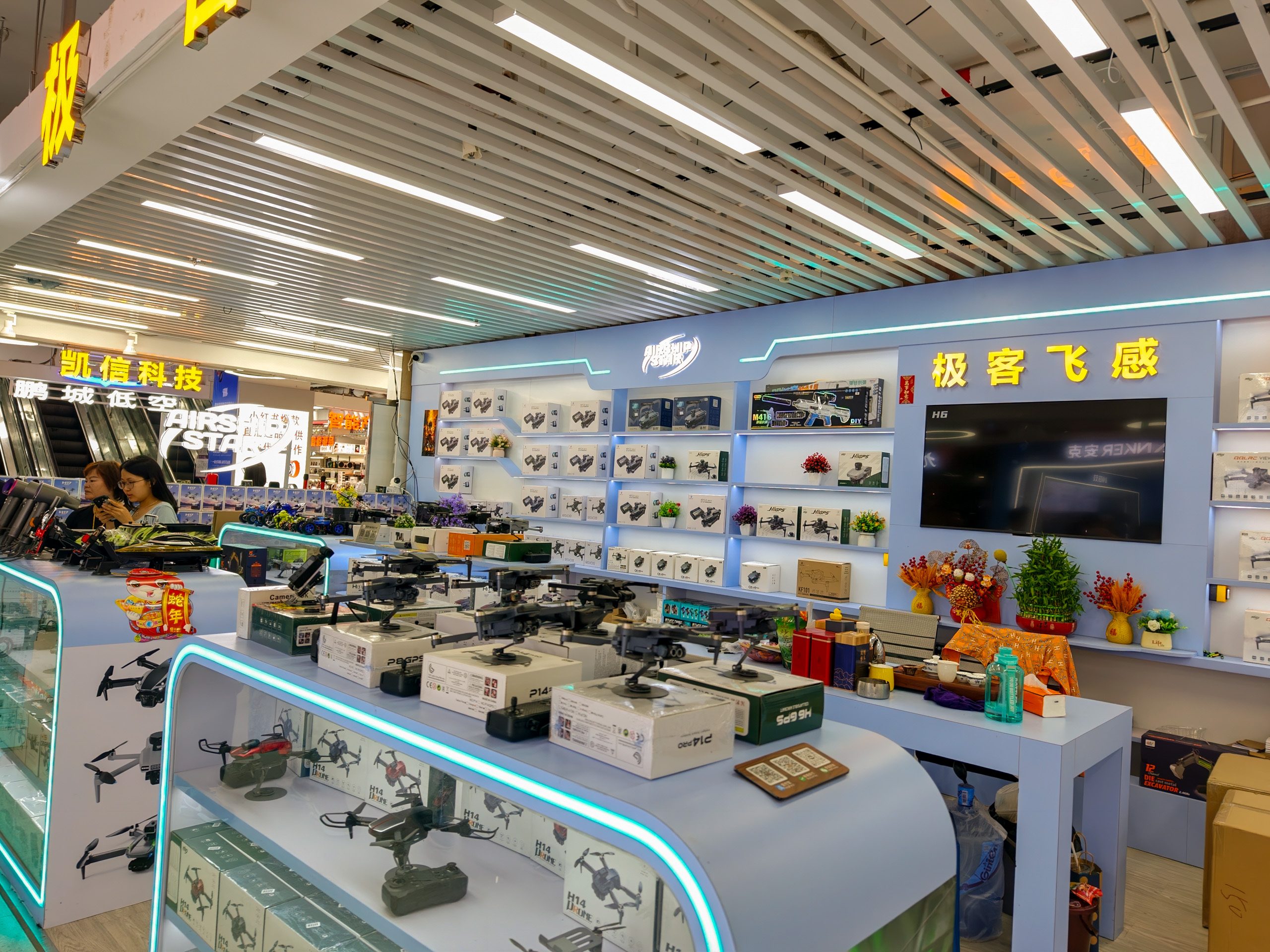 A market stall at Huaqiangbei selling drones and more