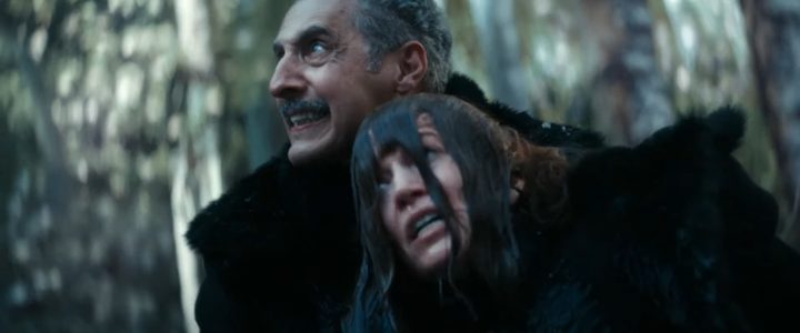 Irving holding a drenched Helly in "Severance"