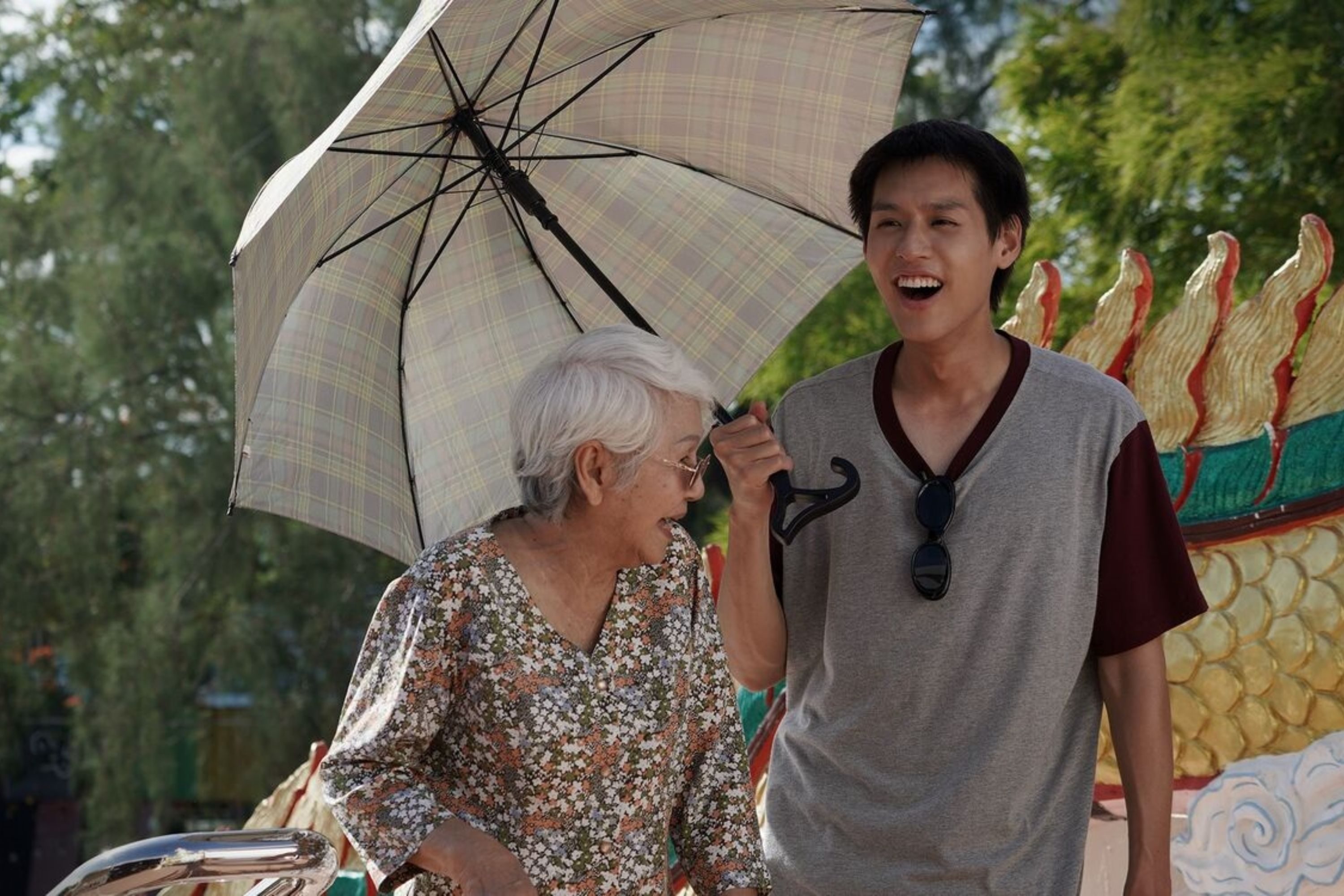 Putthipong Assaratanakul and Usha Seamkhum in How to Make Millions Before Grandma Dies (2024)