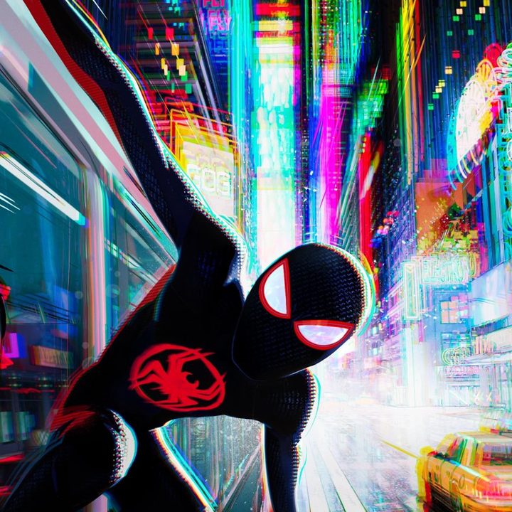 Spider-Man swinging down the streets.