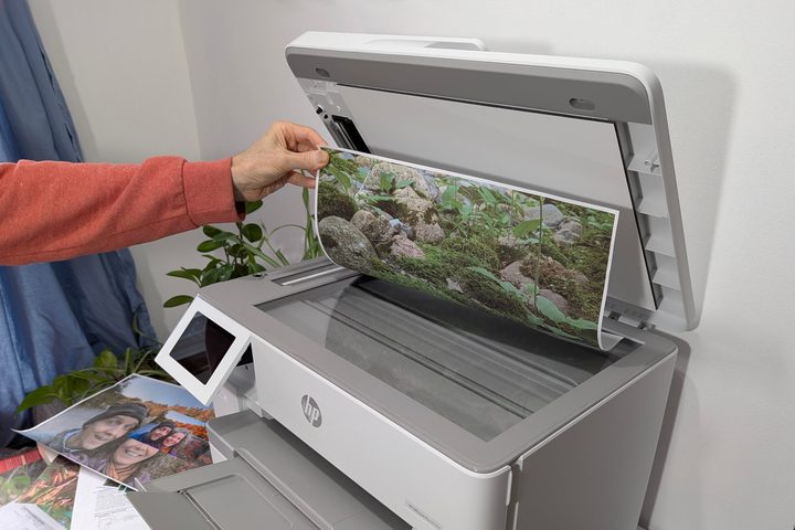 The OfficeJet Pro 9730e can scan 11x17 prints in its large flatbed scanner.