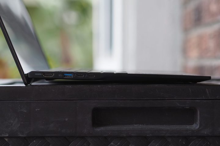 Acer Swift AI 16 side view showing lid and ports.