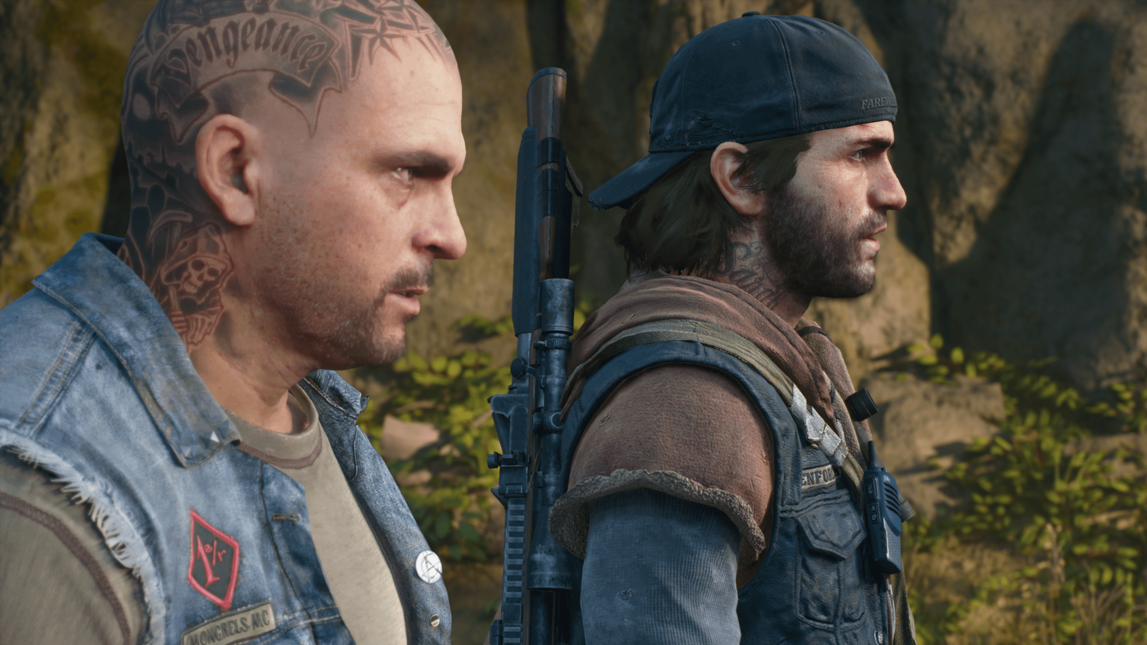 Deacon and Boozer stand side by side in Days Gone Remastered.