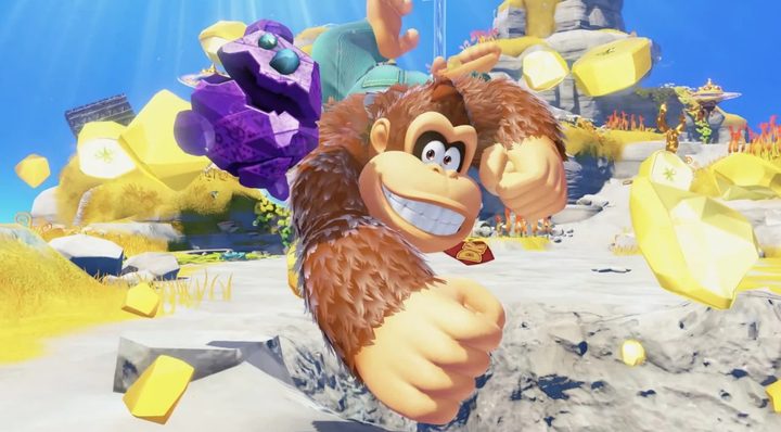 Donkey Kong punching through a crystallized banana in Donkey Kong Bananza.
