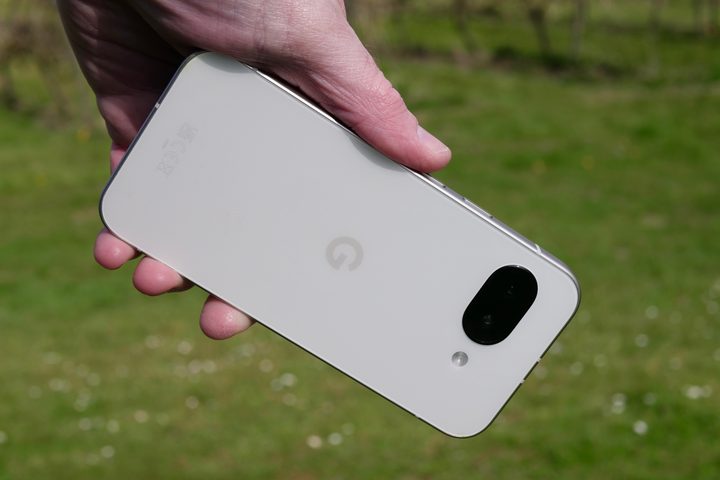 A person holding the Google Pixel 9a.