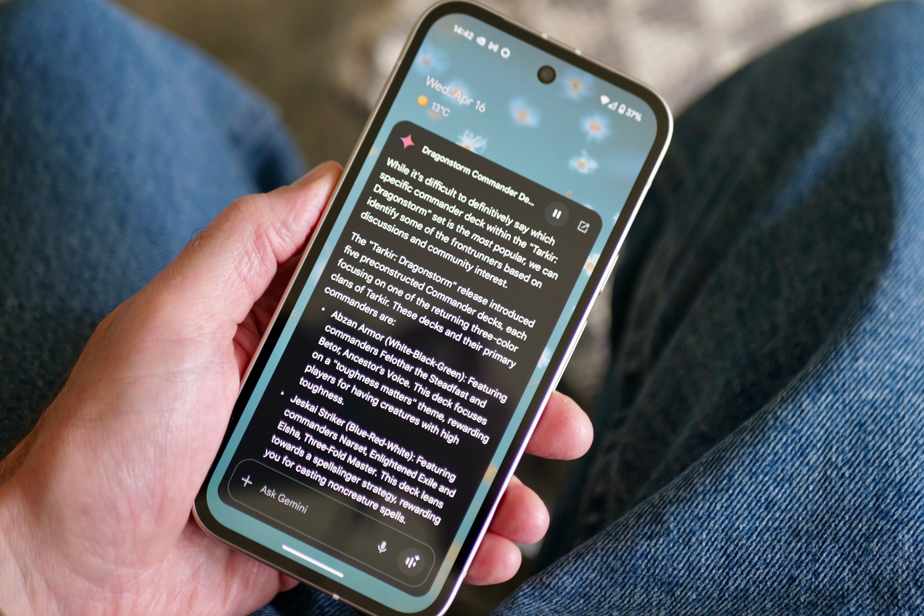 A person using Google Gemini on the Google Pixel 9a.