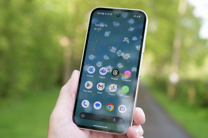A person holding the Google Pixel 9a.