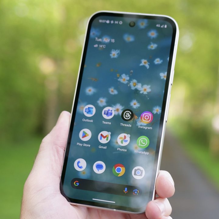 A person holding the Google Pixel 9a.