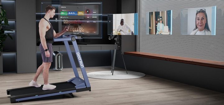 Man watching TV while using treadmill