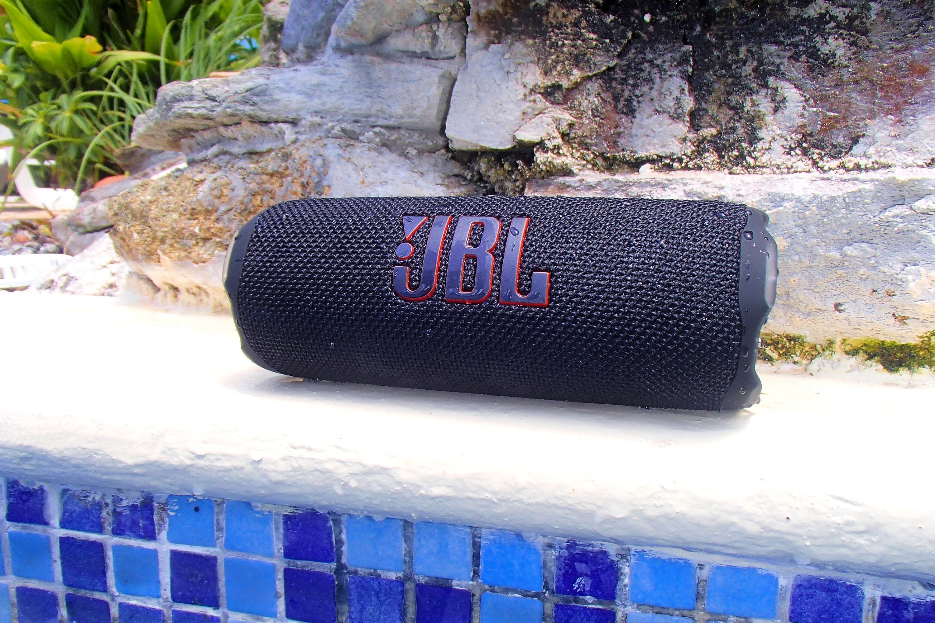 The JBL Flip 7 by the pool.