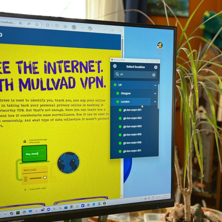 mullvad vpn review s app and website appear on a pc monitor