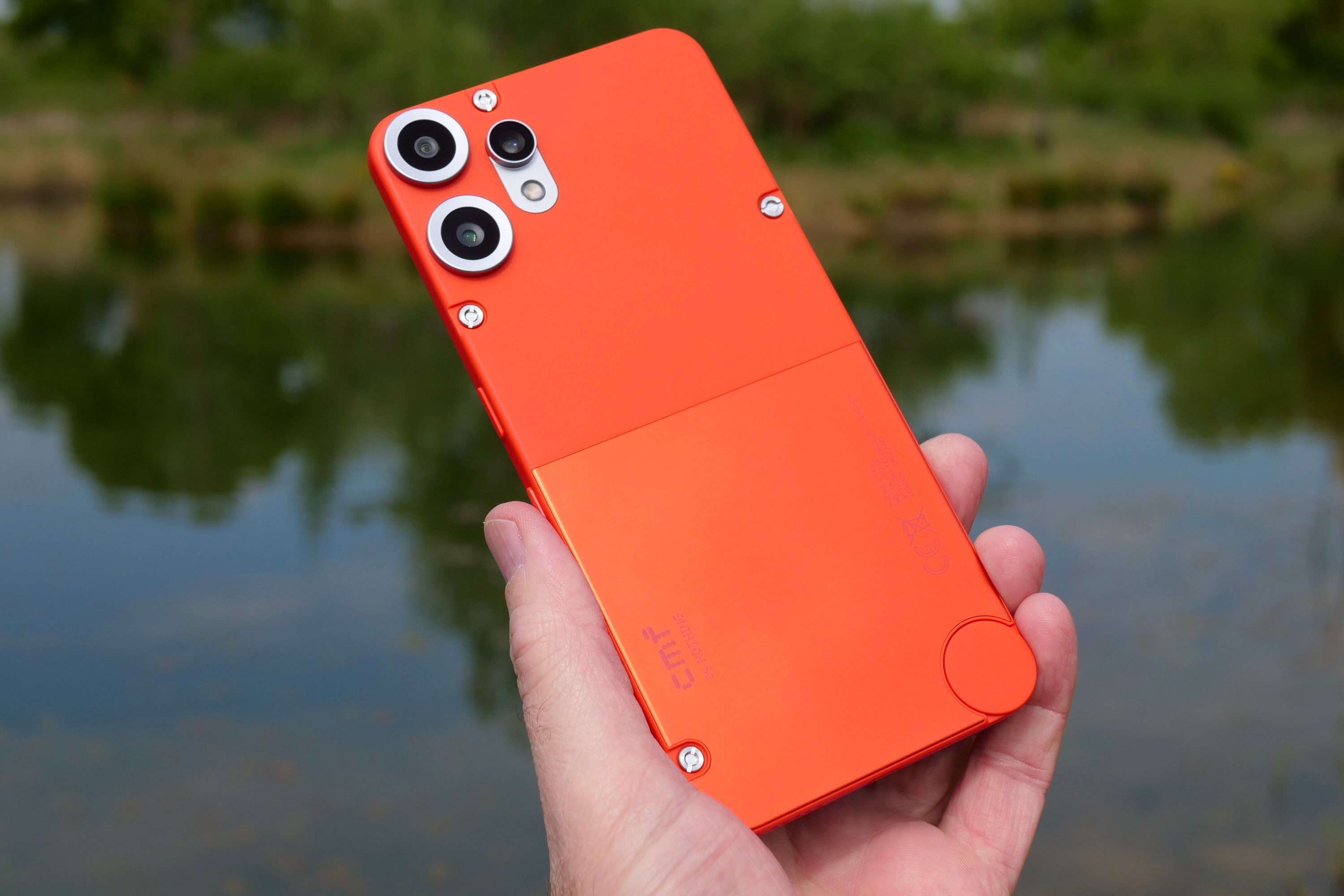A person holding the Nothing CMF Phone 2 Pro.