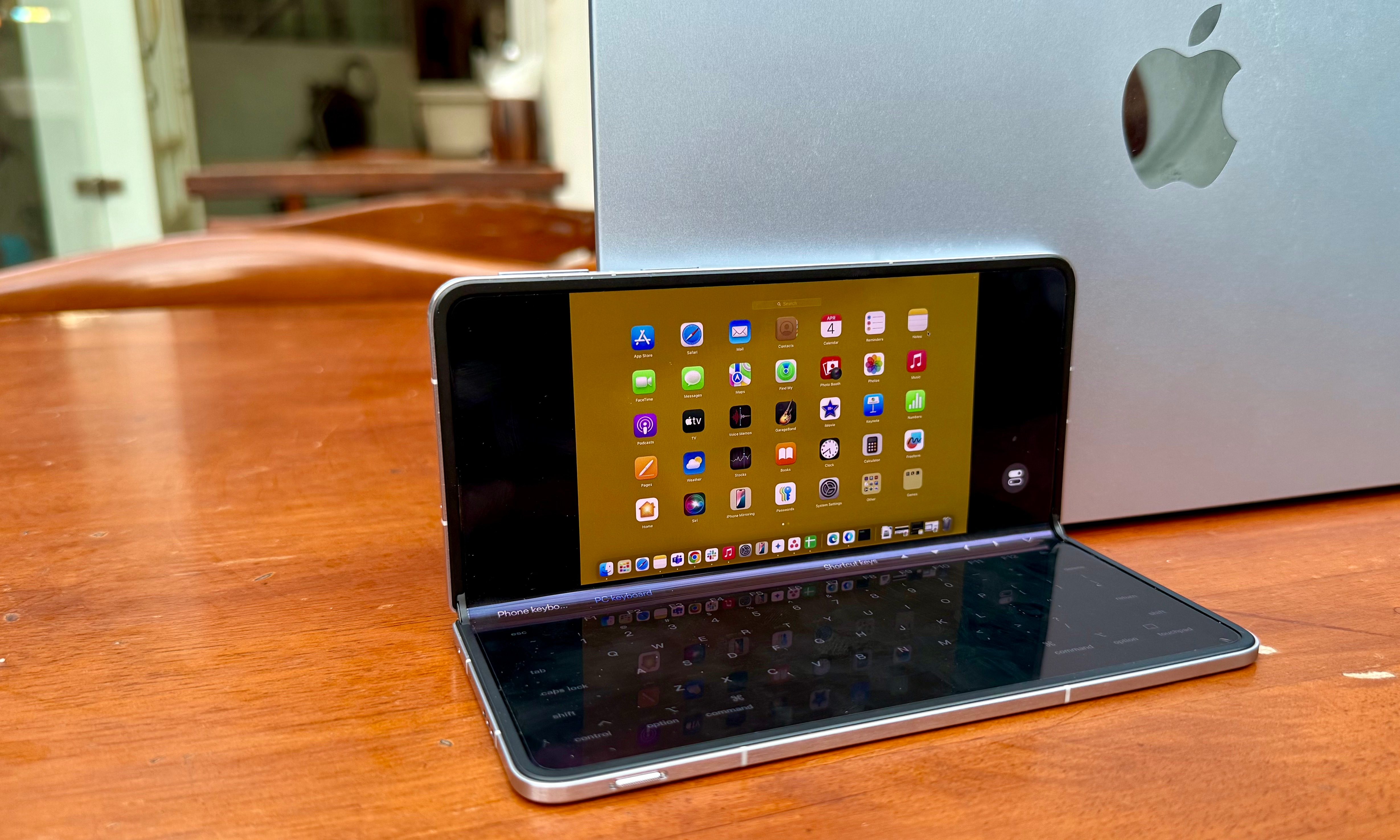 Remote Mac access is happening via an Oppo Find N5 device.