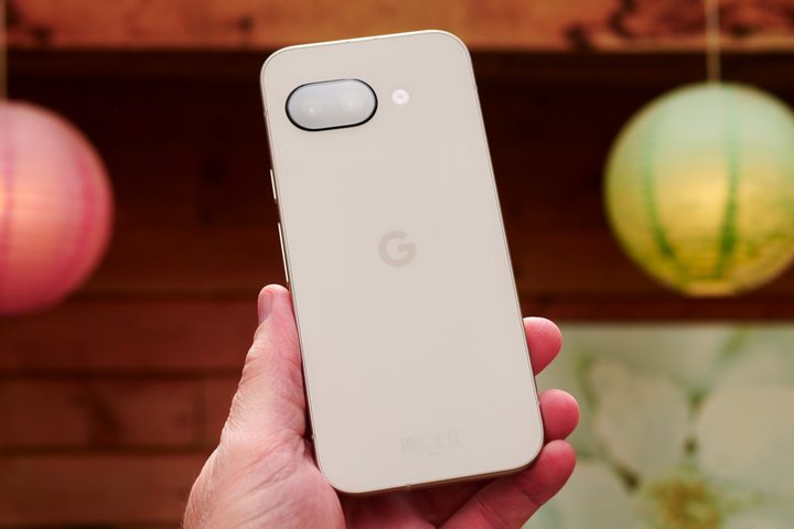 A person holding the Pixel 9a.