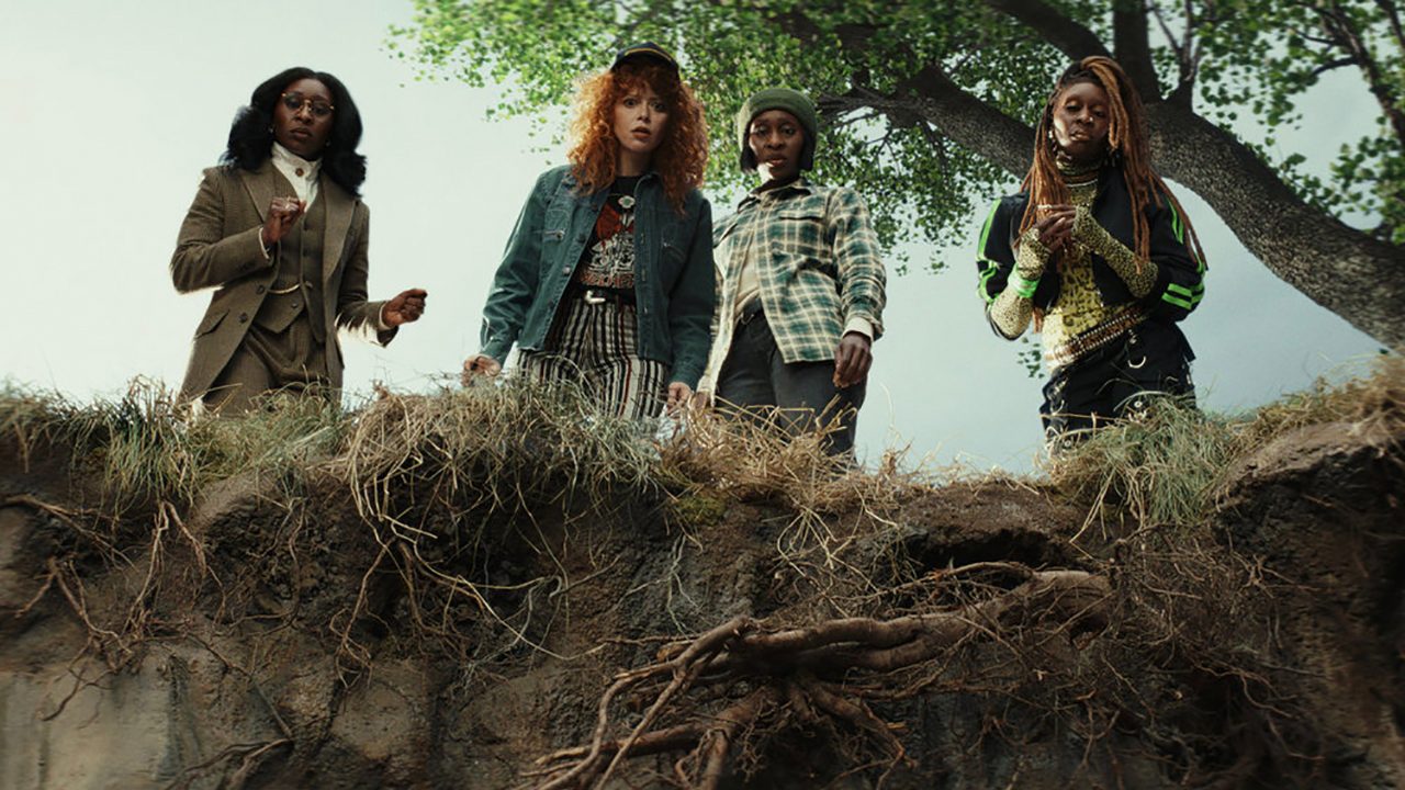 Four women stare into a big hole in the ground looking shocked in Poker Face on Peacock.