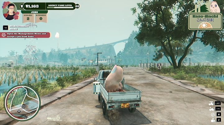 A truck drives through a town in Promise Mascot Agency.