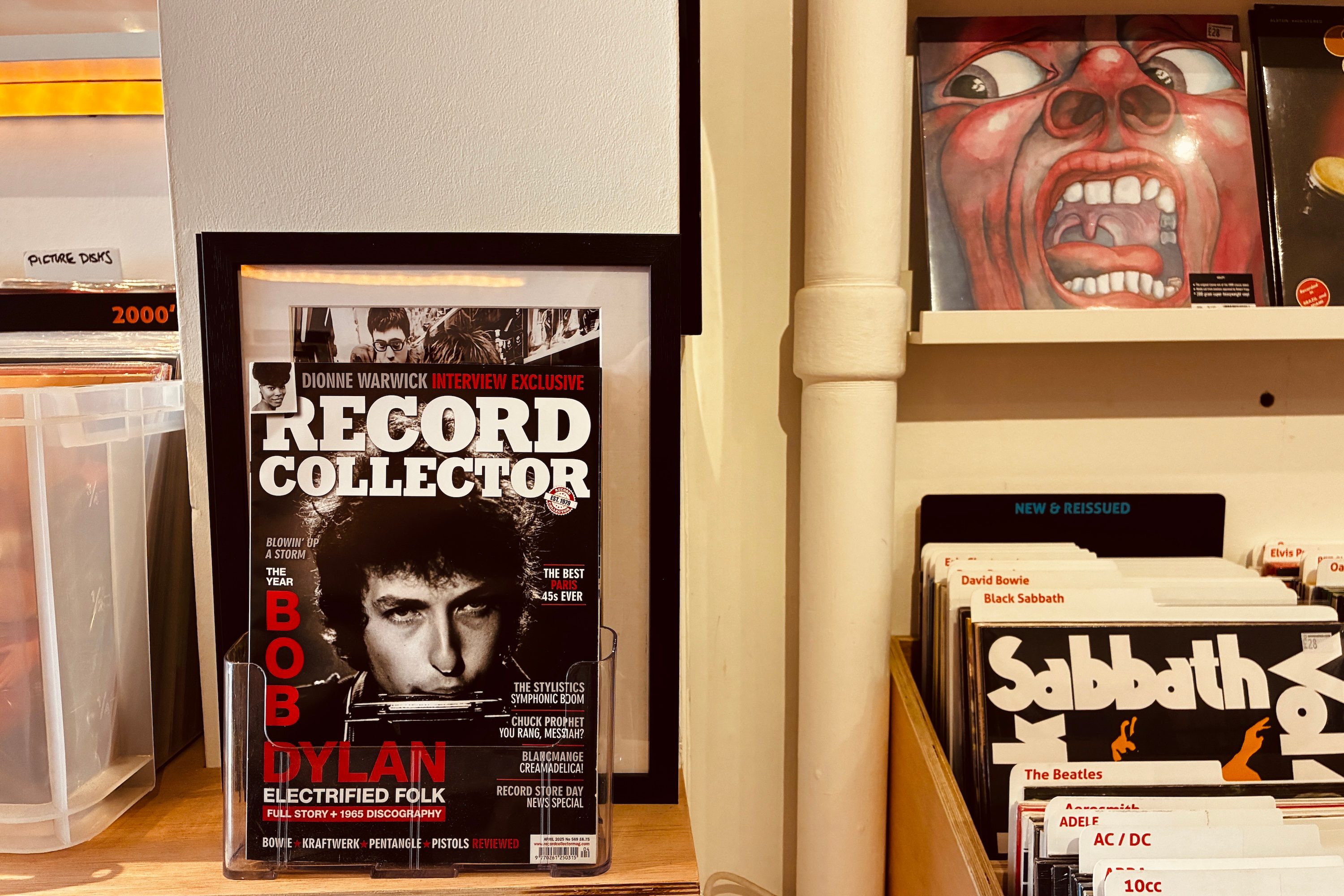 A magazine and records inside Spin Sounds record store in the U.K..