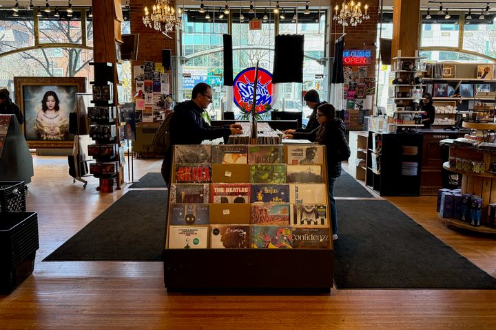 People digging for used records at Sonic Boom Records in Toronto.