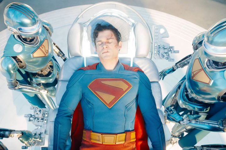 Superman lays on his back with robots around him in "Superman."